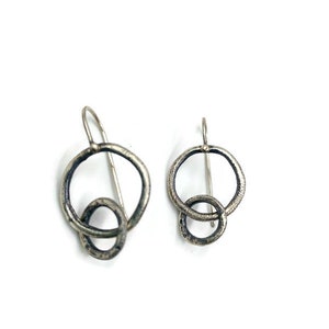 Sterling silver small double circle earrings. Lisa Colby Metalsmith E289)