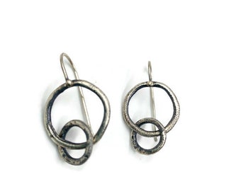 Sterling silver small double circle earrings. Lisa Colby Metalsmith E289)