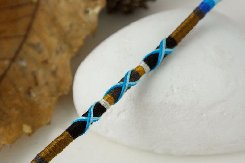 wooden beads and an Om charm Earthy clip in hair braid accessory with blue bead capped end