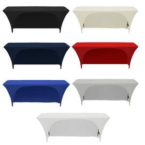 May include: Six tablecloths in different colors: black, white, navy blue, red, royal blue, and gray. The tablecloths are fitted and have a gathered edge. They are designed to fit a standard rectangular table.