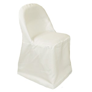 May include: White chair cover for a folding chair. The cover is made of a smooth, wrinkle-resistant fabric.