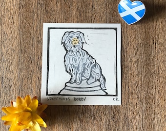 Mini linocut print artwork Greyfriar's Bobby, Edinburgh landmark. lino art Scottish souvenir, hand coloured in with pencils