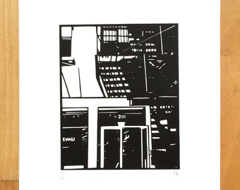 May include: Black and white linocut print of a building with a door labeled "201" and the word "ENAU" on the side.
