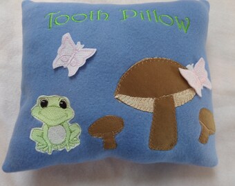 Magic glow-in-the-dark frog tooth pillow