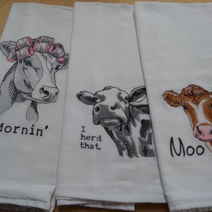 Decorate your kitchen with a 100 percent cotton towel that will make you smile.