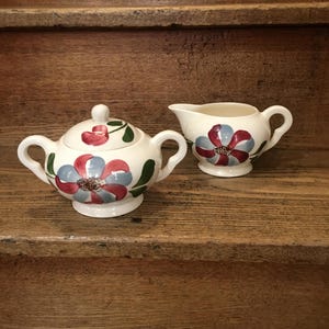 Whirligig Blue Ridge Pottery Creamer and Sugar Bowl Set.