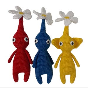 Pikmin 4 vermelho, azul, amarelo, branco, brilho, rosa e roxo com flor, botão ou folha amigurumi de crochê feito à mão