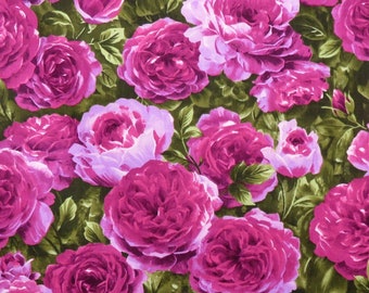 May include: A close-up of a fabric with a repeating pattern of pink roses on a green background.