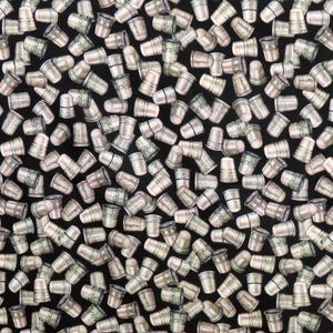 May include: A black background with a repeating pattern of silver thimbles. The thimbles are all different sizes and shapes, and some have a slight pink hue.