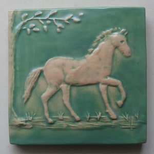 Young horse with tree, art tile