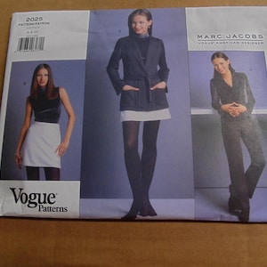 May include: Vogue Patterns sewing pattern envelope featuring three fashion designs. The envelope includes the text "2025 PATTERN/PATRON" and "Marc Jacobs Vogue American Designer". The designs include a blazer, skirt, and pantsuit.