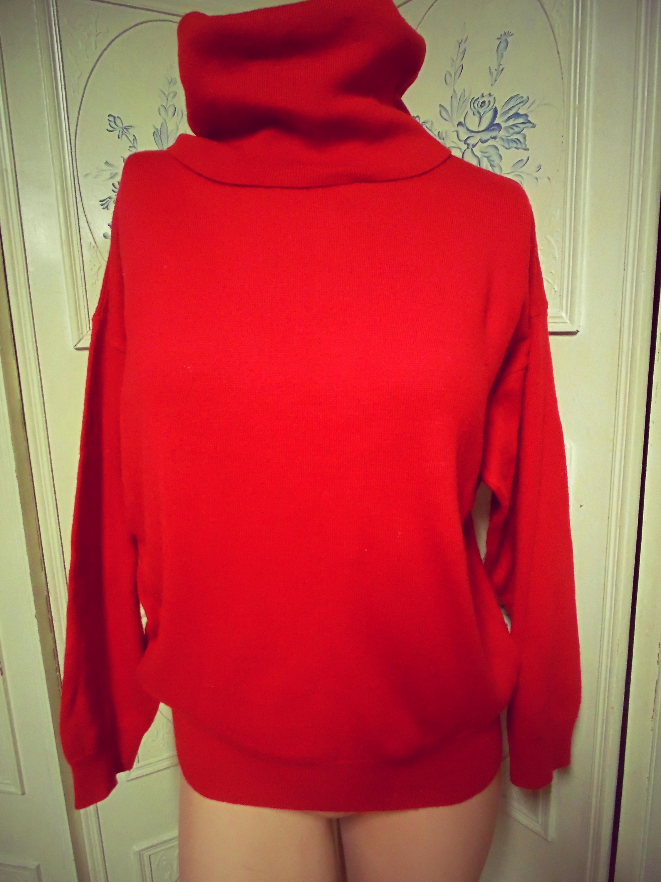 Red sweater deals with hood
