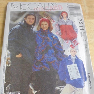 May include: A sewing pattern for a jacket, featuring three models wearing different versions of the jacket. The pattern number is 7311 and the size is Z (Xlg, Xxl). The pattern is titled "Learn to Sew for Fun".