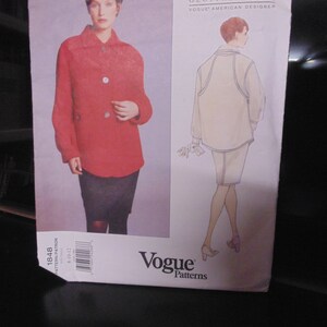 May include: A Vogue sewing pattern for a red jacket and a white sleeveless top. The pattern is by Geoffrey Beene, a Vogue American designer. The pattern number is 1848.