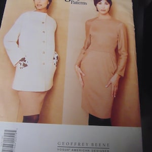 May include: Vogue Patterns sewing pattern featuring a white coat and a beige dress designed by Geoffrey Beene, Vogue American Designer.