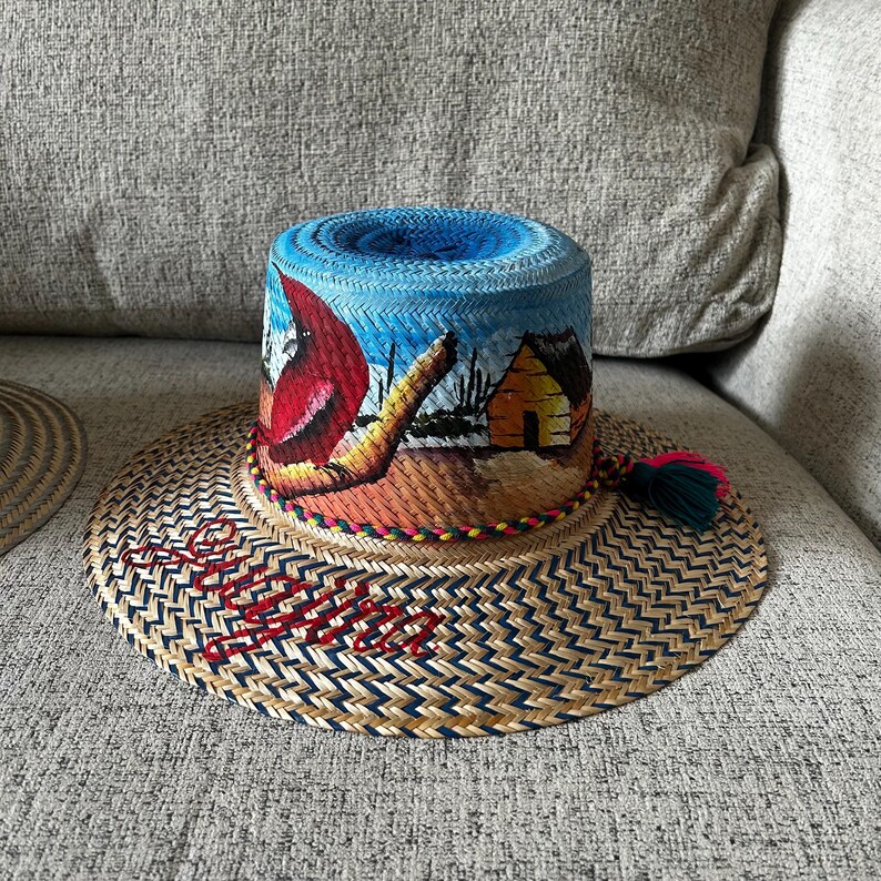 ポンポン付きワユー族の麦わら帽子：手作りのビーチサンハット handpainted La Guaji