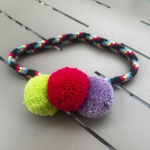 black multicolor pom band
