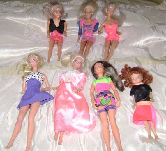 6 barbie dolls