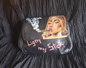 Stone Mountain handpainted purse, with painting of a cigarsmoking lady on it!