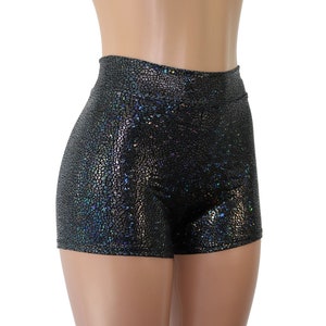 May include: Black iridescent shorts with a high waist and a textured, scaly pattern.