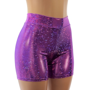 May include: Purple iridescent shorts with a high waist and a stretchy fabric.