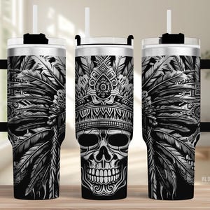 May include: Three stainless steel tumblers with black handles, lids, and straws. Each tumbler has a black and white design of a skull wearing a feathered headdress. The design is detailed and intricate, with a tribal theme.