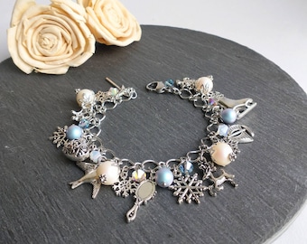 The Snow Queen blue and white charm bracelet, pearl and crystal, snowflake gift, snow jewelry, white pearl bracelet, fairytale jewelry