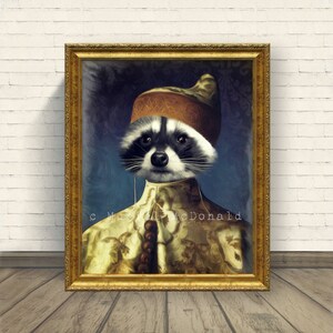 May include: A raccoon wearing a gold and brown patterned robe and a brown hat with gold accents. The raccoon is looking directly at the viewer. The painting is framed in a gold frame. The artist's signature is visible in the bottom right corner of the painting.