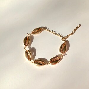 Gold Plated cowrie shell bracelet, gold bracelet, seashell bracelet