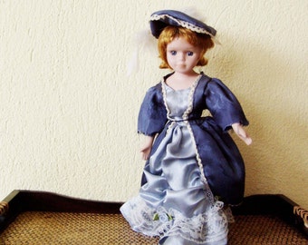 Vintage doll in blue dress, vintage, red haired doll in satin dress, satin overcoat with lace and hat, doll with metal stand, mid seventies