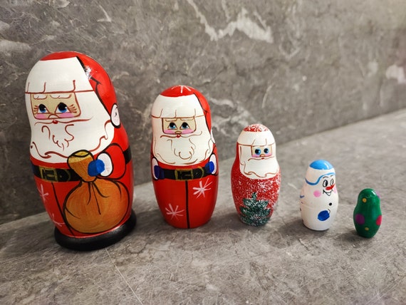 Nesting Santa Claus dolls, wooden dolls set, vintage nesting dolls of cute Santa and snowman
