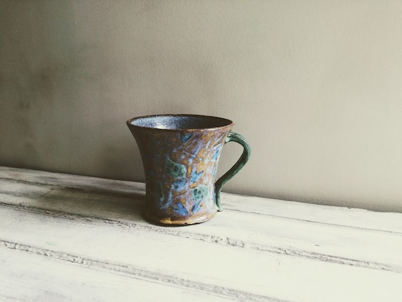 Vintage stoneware mug, folk art ceramic mug with lost wax decoration of green leaves and blue flowers, Greek pottery