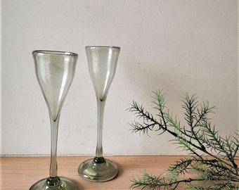 Vintage green goblets, vintage handblown glass in transparent pale green, green liqueur goblet in conical shape, set of two