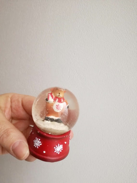 Vintage snow globe, teddy bear snowglobe with Santa hat and scarf, teddy in snowglobe, Xmas collectible teddy bear snowglobe on red base