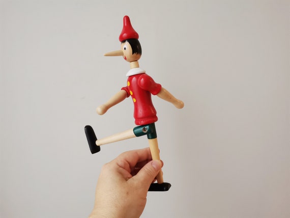 Moving Pinocchio figurine, vintage Pinocchio toy with movable parts, wooden Pinocchio miniature toy, retro wooden toy