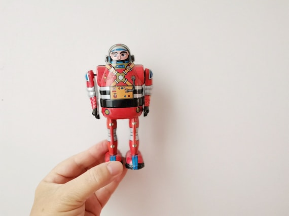 Astronaut wind up toy, collectible astronaut robot toy, tin wind up, Chinese toy of astronaut in red uniform