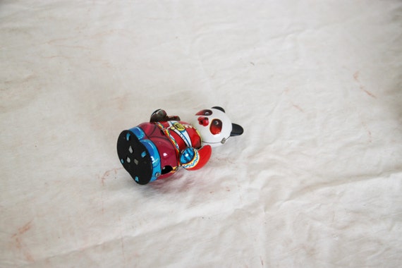 collectible panda bear panda wind up toy early seventies Chinese tin toy Vintage panda tin toy red suit panda toy