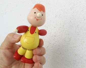 Wooden boy figurine, vintage wooden toy, boy figurine with movable parts, yellow red boy figure with propeller on back, sixties toy