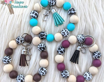 Beaded cow print keychain bracelet