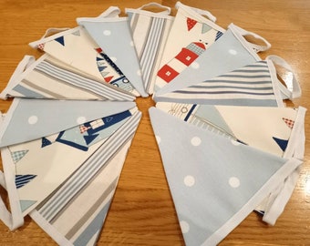 Handmade Nautical Seaside Lighthouse, Beach Hut Boat, Fryetts Bunting with Laura Ashley Blue Strip and Clarke and Clarke Blue Spot