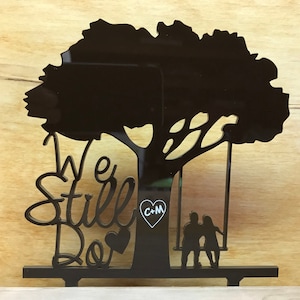 Anniversary We Still Do Silhouette Couple in Swing Under Tree with Initials Cake Topper