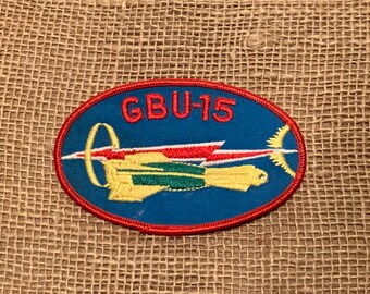 Guided Bomb Unit GBU-15 Rockwell International Unit 15 USAF United States Air Force Desert Storm patch red blue military vintage