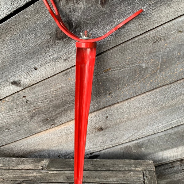 Fishing pole holder rod stand shore fishing red metal vintage reel ground stake lake stream river tool camping backpacking backcountry