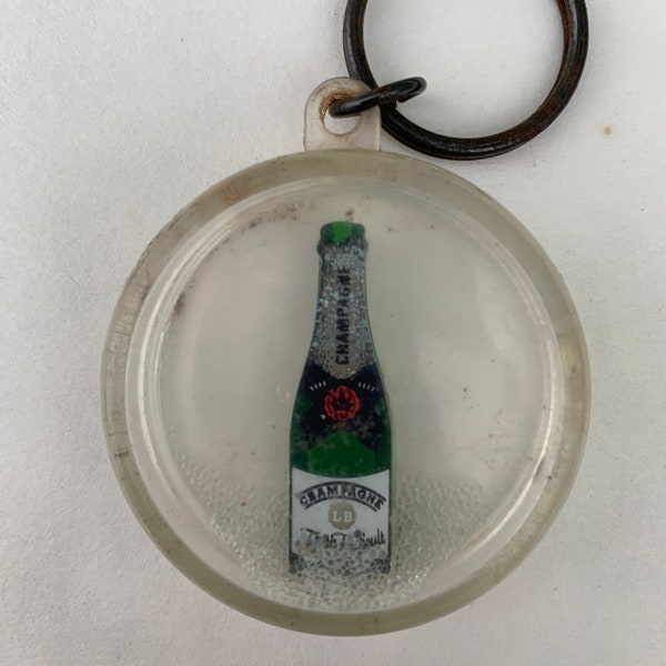 Champagne bottle keychain vintage clear plastic green bubbly beads shaker