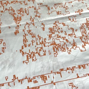 May include: A white ceramic mug with a black handle and the text "But First, Coffee" in a black, bold font. The mug is on a white surface. The mug is approximately 4 inches tall.