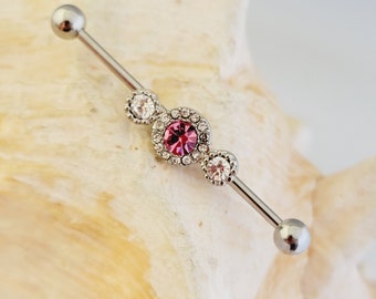 14G industrial barbell with 3 Clear and Pink cubic zirconia multipave gems