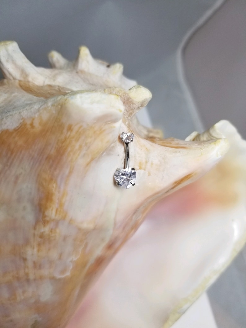 14G Surgical Steel belly ring with Clear heart CZ prong set gems