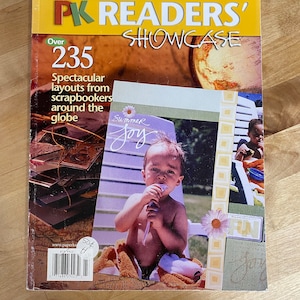 May include: A magazine titled "PK Readers' Showcase" with the text "Over 235 Spectacular layouts from scrapbookers around the globe." The cover features a photo of a child with the words "Summer Joy" and a daisy.