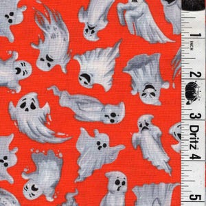 May include: Halloween-themed fabric featuring a repeating pattern of gray ghosts on a bright red background. The ghosts have various expressions and poses. A ruler with inch measurements is visible on the right side.
