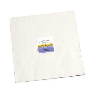 May include: A white fabric square with a purple and yellow label that reads "Ruby Star Society Warp & Weft Moda & Me Hue"